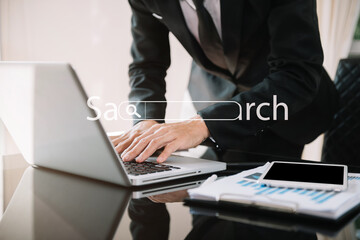 Search bar of internet browser and women working on modern laptop at table indoors, closeup in the...