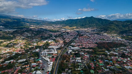 Fototapeta na wymiar Beautiful aerial view of the city Tres Rios Costa Rica in the sunset