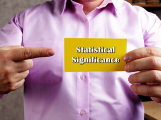 Business concept about Statistical Significance with sign on the page.