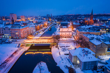 Obraz premium Aerial view of downtown Bydgoszcz after sunset in winter