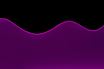 Waving water in aquarium in neon light against black background