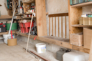 Various carpenter's tools and supplies in a garage.