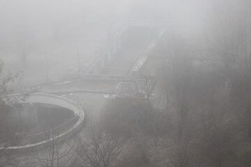 PM 2.5 air pollution with heavy dust from illegal incineration of garbage and construction waste PM 10