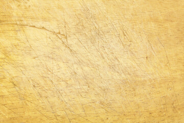 Old grunge wooden kitchen cutting board as background, chopping board close up	