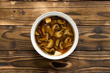 Traditional Japanese soup with shiitake mushrooms, onion and tofu cheese