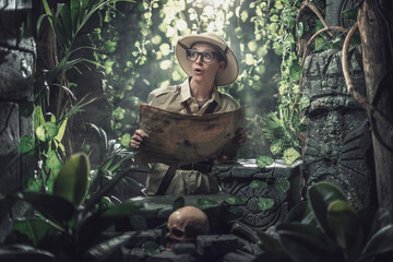 Cheerful woman exploring a tropical jungle