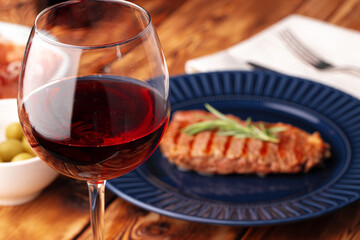 Grilled beef steak served on blue plate