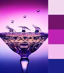 Three Umbrella Water Drops In A Glass With Color Theme