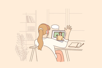 Online education, distant learning during pandemic concept. Homeschool girl student sitting backwards greeting teacher during virtual internet online class during coronavirus epidemic and lockdown
