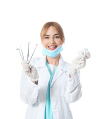 Female dentist on white background