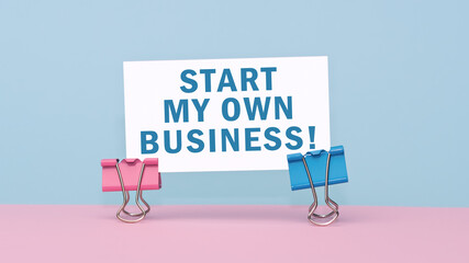 Start my own Business - concept of text on business card on pink and blue background