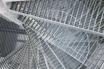 A Metal staircase winding up in circles