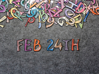 Feb 24th Hand-drawn keyword colorful puzzle with grey furry background projection view top view