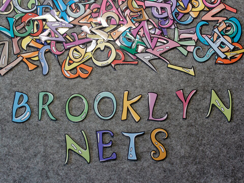 Brooklyn Nets Hand-drawn keyword colorful puzzle with grey furry background projection view