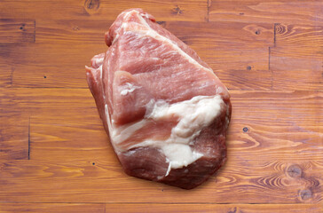 A large piece of meat cut up for cooking dinner