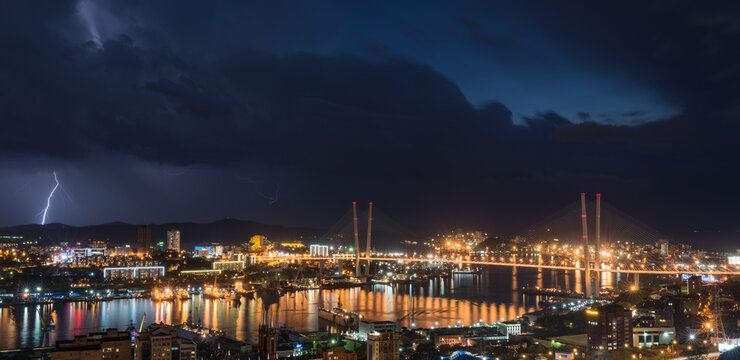 Lightning storm over night city.