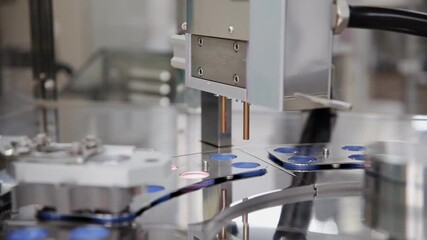 The process of lipstick production in a cosmetics factory. Cosmetic industry.