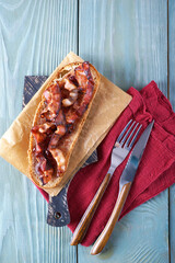 Toast with fried bacon and strawberry jam