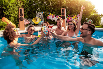 Group of friends have pool party