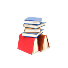 Stack of books in colour covers with white sheets isolated on a white background