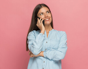 beautiful casual woman feeling pleased by her phone conversation