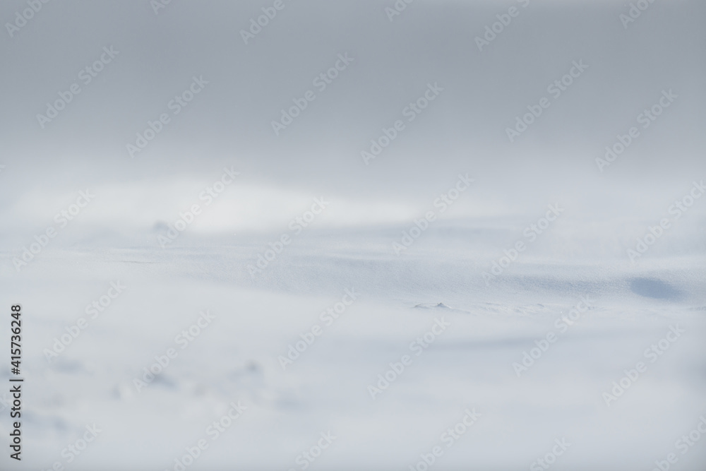 Sticker Beautiful winter background with snowy field. Natural winter texture.