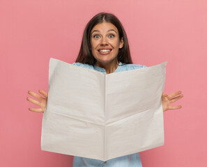 Fototapeta premium casual woman feeling excited after reading the newspaper