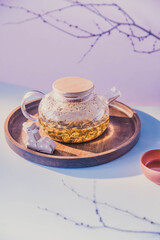 still life in the Japanese style. brewing Japanese green tea with fried rice. kettles with boiling water. brewing Genmaicha in a transparent teapot
