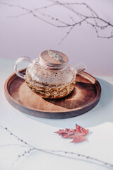 still life in the Japanese style. brewing Japanese green tea with fried rice. kettles with boiling water. brewing Genmaicha in a transparent teapot