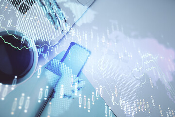 Double exposure of forex graph drawing over desktop background with computer. Concept of financial analysis. Top view.