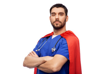 healthcare, profession and medicine concept - doctor or male nurse in blue uniform and red superhero cape with stethoscope over white background © Syda Productions