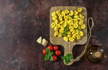 Homemade raw Italian stuffed pasta tortellini