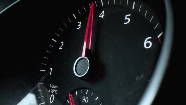 Tachometer shows rpm. Close up  display engine revolutions per second. Moving arrow