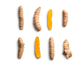 Indian turmeric root. Turmeric spice. Yellow turmeric on white background.