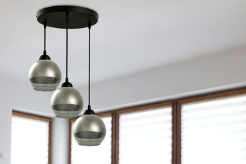 Lamp in home interior and window background 