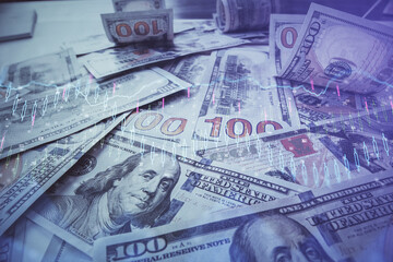 Multi exposure of forex chart drawing over us dollars bill background. Concept of financial success markets.