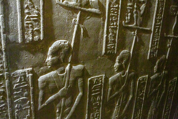 Dendera Temple complex in Egypt. Hieroglypic carvings on wall at the ancient egyptian temple.
