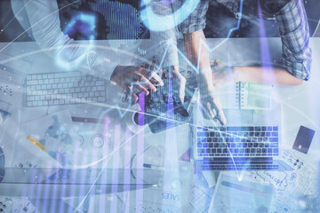 Double exposure of man and woman working together and financial graph hologram drawing. market analysis concept. Computer background. Top View.