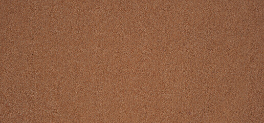 Sea beach sand texture background. Flat lay long web banner copy space.