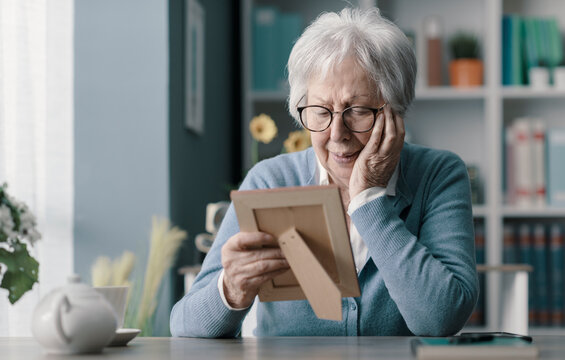 Sad old woman mourning the loss of her husband