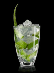 Aloe vera cocktail on black background