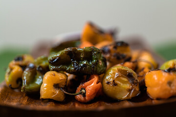 lightly burned habanero peppers for spicy Mexican sauce