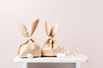 Festive Easter card with gifts and eggs decorated with flowers