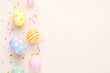 Happy Easter day decoration colorful eggs on paper background with copy space.