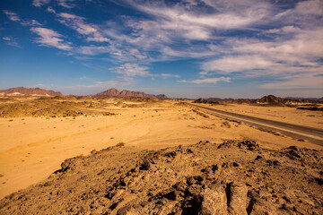 Beautiful landscape of sand dunes in Egypt. Sahara Desert. Background of orange sand wave. Africa desert
