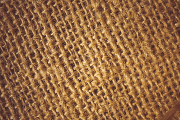 Close-up weaving. Linen thread is woven into fabric.