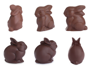 Set with chocolate Easter bunnies on white background