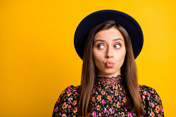 Portrait of adorable person look empty space kiss lips headwear retro clothing isolated on yellow color background