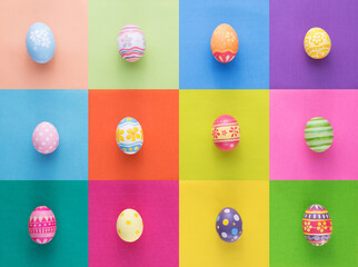 Happy Easter day decoration eggs on colorful paper background