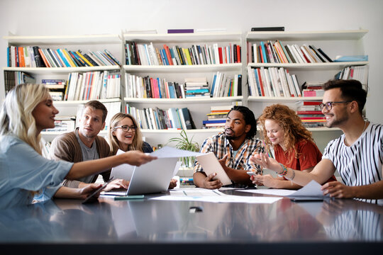 Creative brainstorming. Happy business people, designers, architects working as a team in office